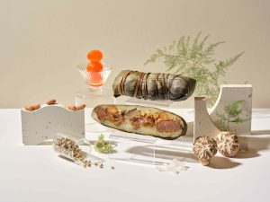 Li Bai Cantonese Restaurant Teochew Beef Rice Dumpling — elongated bak chang cross-section with sliced beef, lotus seeds and barley, fine dining Chinese restaurant Singapore